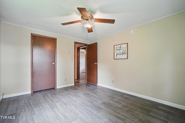 271 Anderson St, Pennington Gap, VA 24277 - unfurnished bedroom with wood finished floors, crown molding, ceiling fan, and a closet