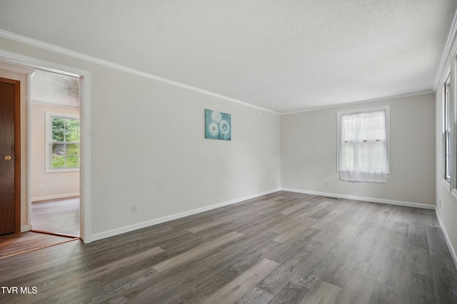 271 Anderson St, Pennington Gap, VA 24277 - unfurnished room with a textured ceiling, ornamental molding, and wood finished floors