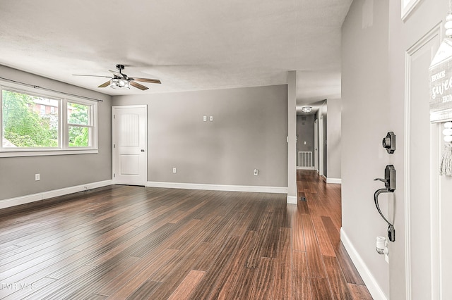 53 Grove Ave, Lebanon, VA 24266 - unfurnished room with ceiling fan and dark wood-style flooring