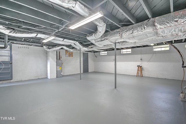 53 Grove Ave, Lebanon, VA 24266 - below grade area featuring electric water heater and concrete block wall