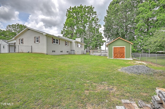 53 Grove Ave, Lebanon, VA 24266 - fenced backyard featuring a storage shed
