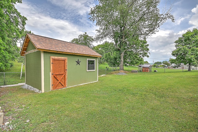 53 Grove Ave, Lebanon, VA 24266 - fenced backyard with a storage unit