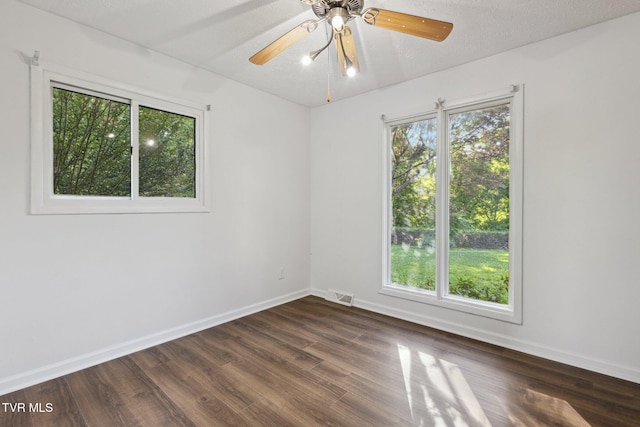 18134 Cleveland Rd, Abingdon, VA 24211 - empty room featuring dark wood-style flooring and a ceiling fan
