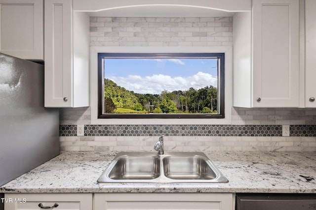 18134 Cleveland Rd, Abingdon, VA 24211 - kitchen with backsplash, white cabinetry, and healthy amount of natural light