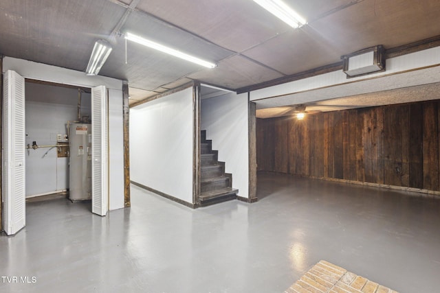 18134 Cleveland Rd, Abingdon, VA 24211 - finished basement with electric water heater, stairway, and wooden walls
