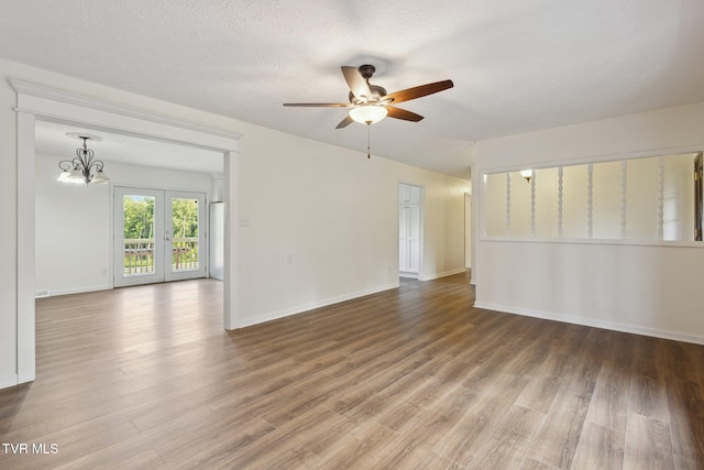 18134 Cleveland Rd, Abingdon, VA 24211 - spare room featuring a ceiling fan, wood finished floors, and a chandelier