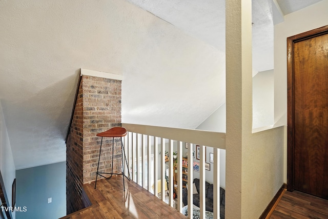 8445 Pendleton Rd, Wise, VA 24293 - hallway featuring wood finished floors and lofted ceiling