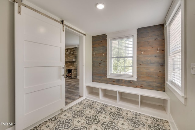 3528 Crestwood Dr, Kingsport, TN 37664 - mudroom featuring a barn door, wood walls, and plenty of natural light