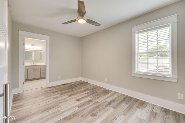 3528 Crestwood Dr, Kingsport, TN 37664 - unfurnished bedroom featuring light wood-style floors, ensuite bath, and a ceiling fan