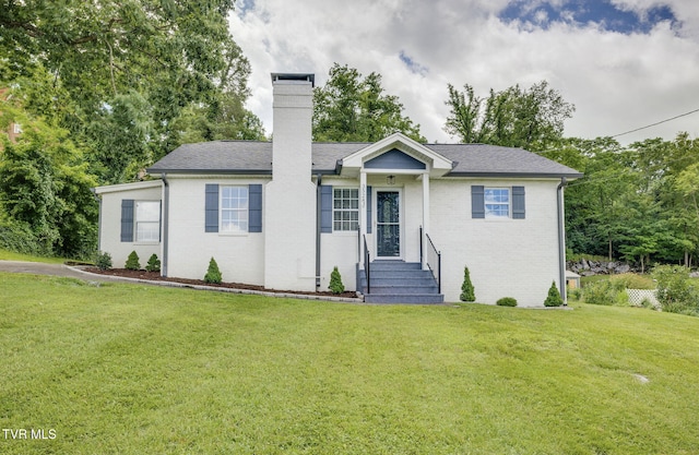 3528 Crestwood Dr, Kingsport, TN 37664 - single story home featuring a chimney, a front yard, and brick siding