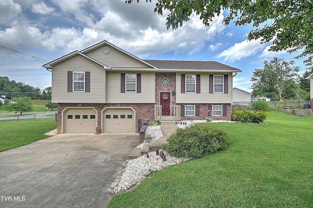 103 Jenny Ln, Jonesborough, TN 37659 - bi-level home featuring a garage, concrete driveway, and brick siding