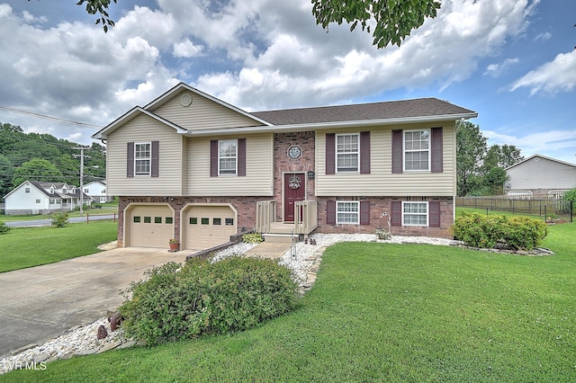 103 Jenny Ln, Jonesborough, TN 37659 - split foyer home with an attached garage, driveway, and brick siding
