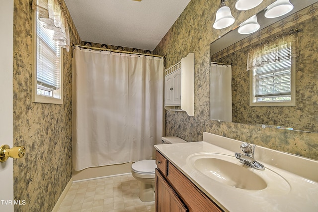 103 Jenny Ln, Jonesborough, TN 37659 - full bathroom with healthy amount of natural light, vanity, a textured ceiling, wallpapered walls, and shower / bath combo