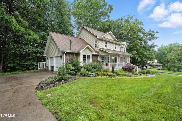 209 Timberland Cir, Kingsport, TN 37664 - view of front of home featuring covered porch, brick siding, concrete driveway, a front lawn, and roof with shingles
