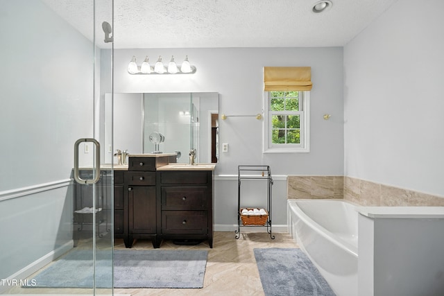 209 Timberland Cir, Kingsport, TN 37664 - full bathroom featuring vanity, a garden tub, a textured ceiling, and tile patterned floors