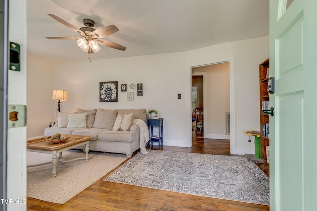 49 24th St, Bristol, TN 37620 - living room featuring a ceiling fan and wood finished floors
