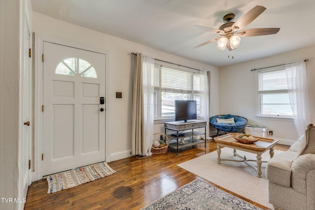49 24th St, Bristol, TN 37620 - entrance foyer with healthy amount of natural light, wood finished floors, and ceiling fan