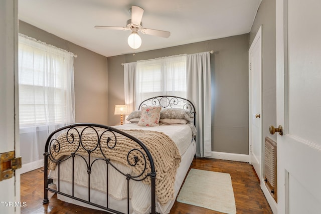 49 24th St, Bristol, TN 37620 - bedroom featuring multiple windows, a ceiling fan, and wood finished floors