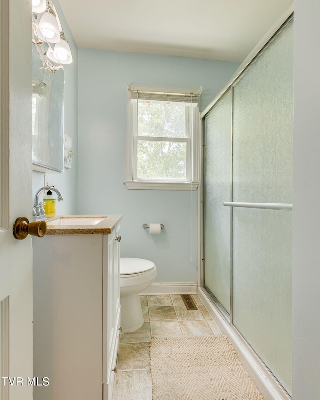 49 24th St, Bristol, TN 37620 - bathroom with a shower with shower door and vanity