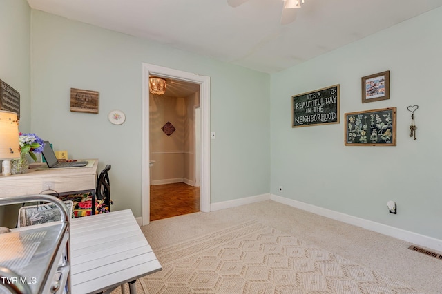 49 24th St, Bristol, TN 37620 - laundry room with light carpet and ceiling fan