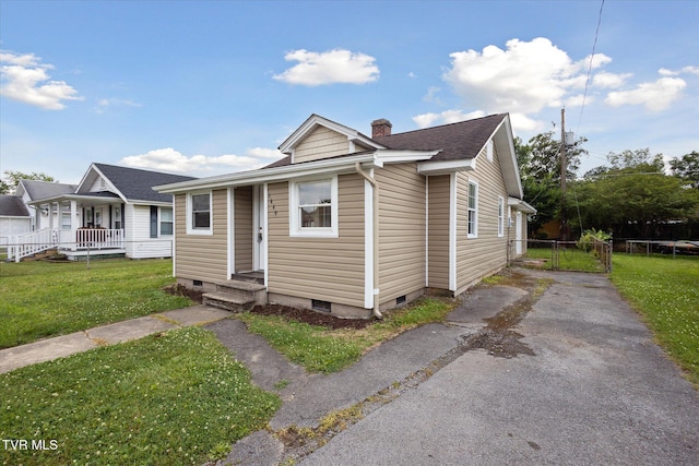 1449 E Sevier Ave, Kingsport, TN 37664 - view of front facade with a chimney, crawl space, and a shingled roof