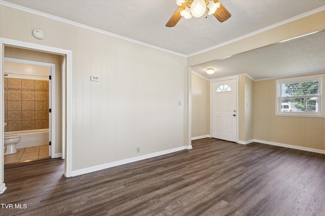 1449 E Sevier Ave, Kingsport, TN 37664 - unfurnished room featuring dark wood-style floors, a ceiling fan, a smoke detector, and crown molding