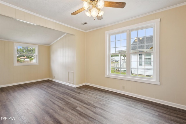 1449 E Sevier Ave, Kingsport, TN 37664 - spare room with dark wood-type flooring, a ceiling fan, and crown molding