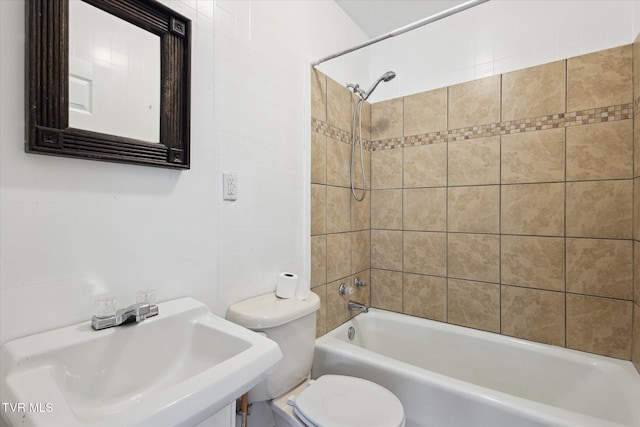 1449 E Sevier Ave, Kingsport, TN 37664 - bathroom featuring shower / bath combination and tile walls