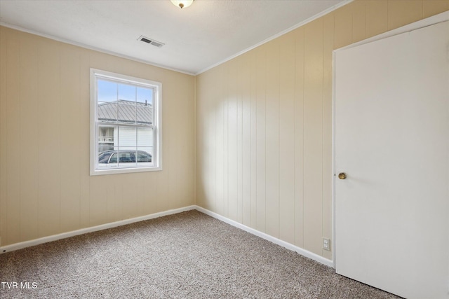 1449 E Sevier Ave, Kingsport, TN 37664 - carpeted spare room featuring baseboards and crown molding