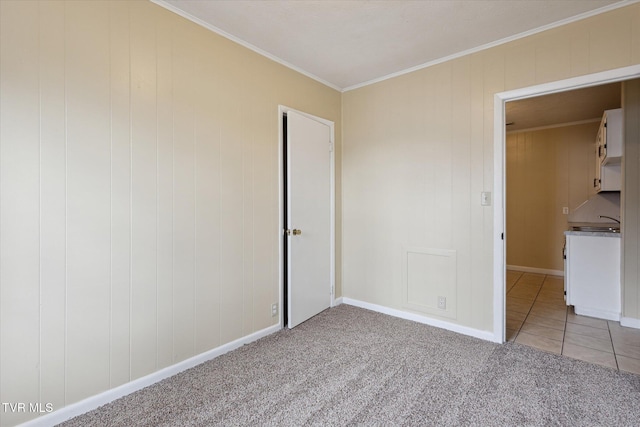 1449 E Sevier Ave, Kingsport, TN 37664 - unfurnished bedroom featuring crown molding and light carpet