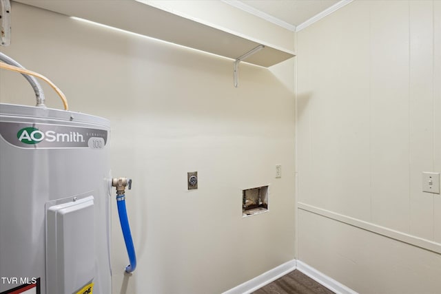 1449 E Sevier Ave, Kingsport, TN 37664 - laundry area with crown molding, washer hookup, and dark wood-style floors