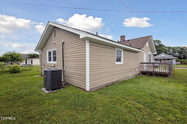 1449 E Sevier Ave, Kingsport, TN 37664 - view of property exterior featuring a central AC unit and a wooden deck