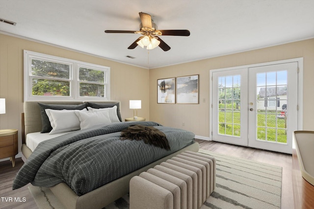 1449 E Sevier Ave, Kingsport, TN 37664 - bedroom with access to exterior, french doors, wood finished floors, crown molding, and ceiling fan