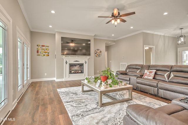 20385 Yeary Trl, Abingdon, VA 24211 - living area with dark wood finished floors, recessed lighting, a ceiling fan, crown molding, and a fireplace