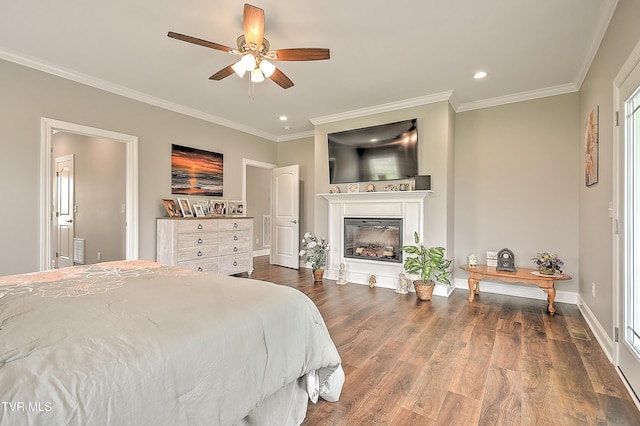 20385 Yeary Trl, Abingdon, VA 24211 - bedroom featuring recessed lighting, ornamental molding, wood finished floors, a glass covered fireplace, and ceiling fan