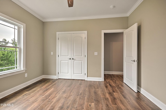 20385 Yeary Trl, Abingdon, VA 24211 - unfurnished bedroom with dark wood-style floors, crown molding, and a closet