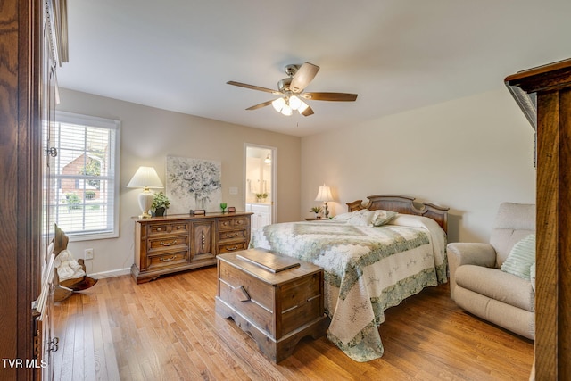 15 E Dale Ct, Greeneville, TN 37745 - bedroom with light wood finished floors, ceiling fan, and connected bathroom