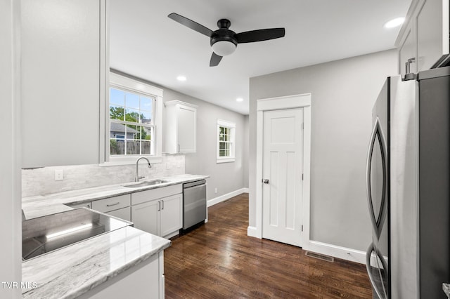 409 Pennsylvania Ave, Bristol, TN 37620 - kitchen featuring stainless steel appliances, a ceiling fan, white cabinetry, dark wood-type flooring, and recessed lighting