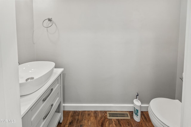409 Pennsylvania Ave, Bristol, TN 37620 - half bathroom with wood finished floors and vanity