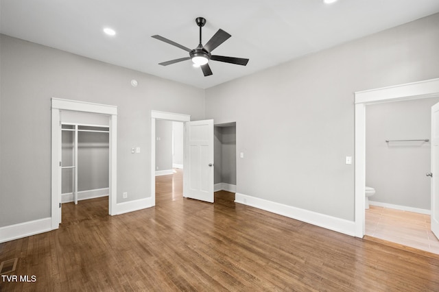 409 Pennsylvania Ave, Bristol, TN 37620 - unfurnished bedroom featuring wood finished floors, a spacious closet, a closet, recessed lighting, and connected bathroom