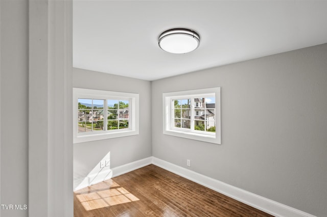 409 Pennsylvania Ave, Bristol, TN 37620 - unfurnished room featuring baseboards and dark wood-type flooring