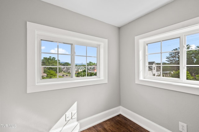 409 Pennsylvania Ave, Bristol, TN 37620 - empty room featuring baseboards and dark wood finished floors