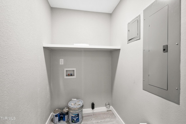 409 Pennsylvania Ave, Bristol, TN 37620 - laundry room with electric panel, hookup for a washing machine, and wood finished floors