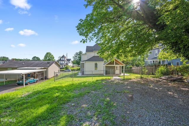 409 Pennsylvania Ave, Bristol, TN 37620 - fenced yard featuring a residential view and a carport