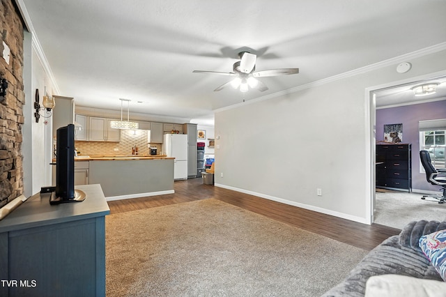 169 Mays Rd, Elizabethton, TN 37643 - living area with ceiling fan, dark wood-style floors, ornamental molding, and a desk