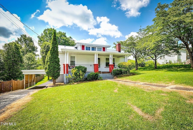 227 Jonesboro Dr, Bluff City, TN 37618 - view of front of home with covered porch, a chimney, and a carport