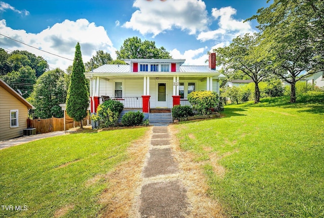 227 Jonesboro Dr, Bluff City, TN 37618 - bungalow-style house with a chimney, covered porch, and a metal roof