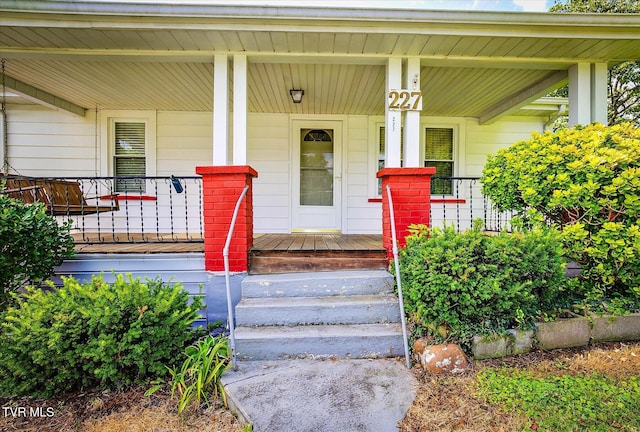 227 Jonesboro Dr, Bluff City, TN 37618 - doorway to property with covered porch