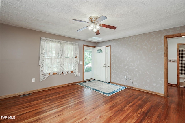227 Jonesboro Dr, Bluff City, TN 37618 - entryway featuring wood finished floors, a textured ceiling, and a ceiling fan