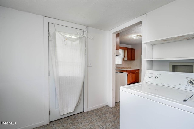 227 Jonesboro Dr, Bluff City, TN 37618 - washroom with washer / dryer, a textured ceiling, and light floors
